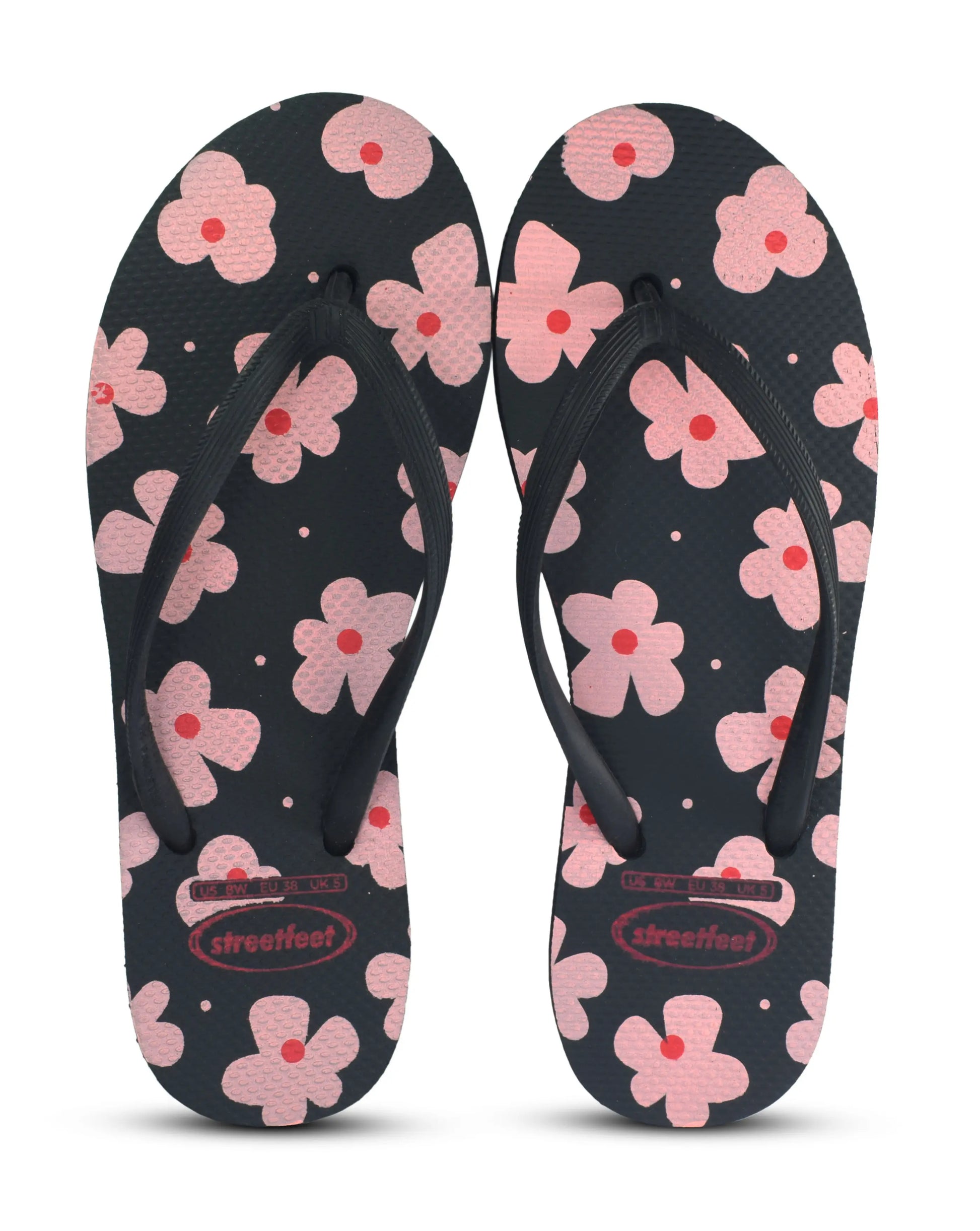 Street Feet's Flower Design Flip-Flops in black sole and pink flowers, featuring soft soles and durable rubber straps for maximum comfort. Lightweight and breathable, ideal for casual wear.