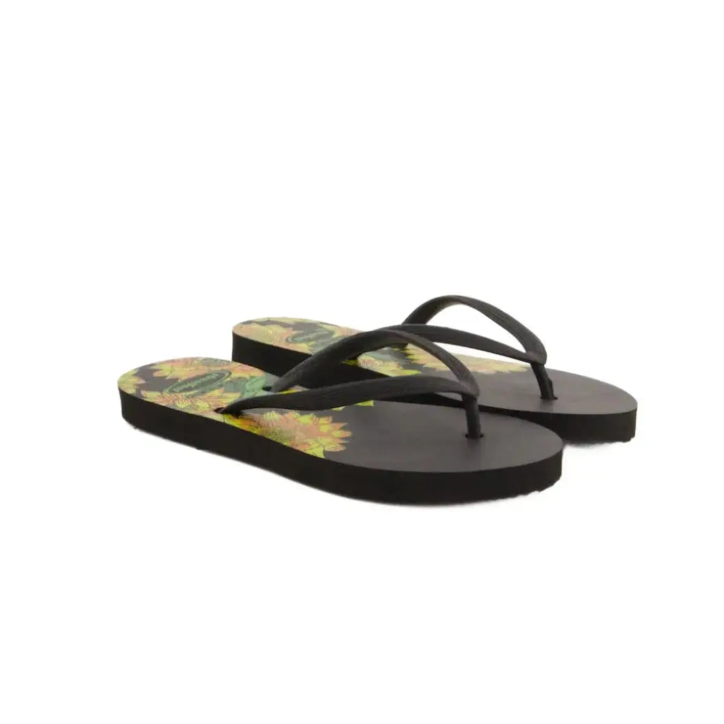 Bloom Flip-Flops featuring a yellow floral design, soft cushioned soles, and durable rubber straps for everyday comfort. Available in 4 variants- yellow, red, black and white.