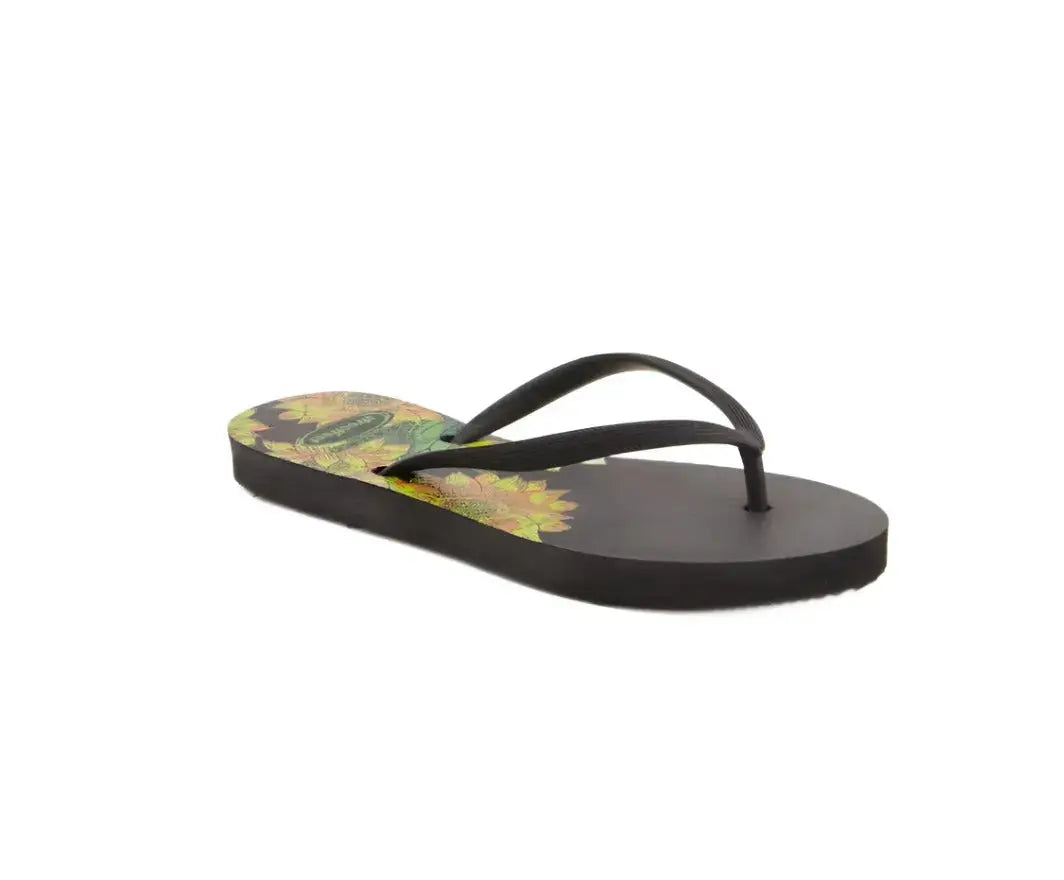 Bloom Flip-Flops featuring a yellow floral design, soft cushioned soles, and durable rubber straps for everyday comfort. Available in 4 variants- yellow, red, black and white.