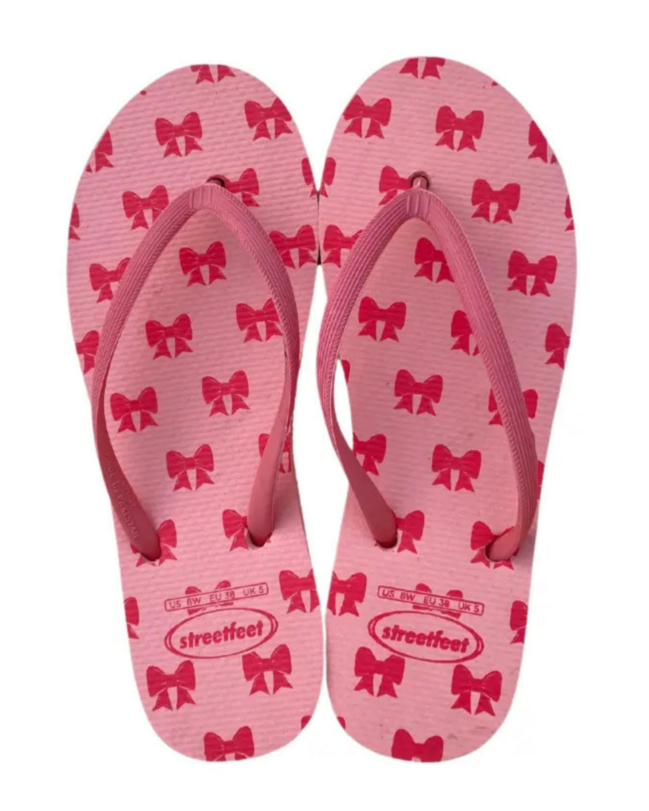 StreetFeet Coquette flip flops for women in pink with bow print

