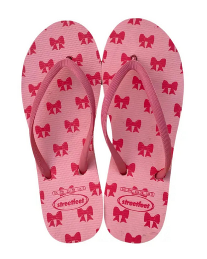 StreetFeet Coquette flip flops for women in pink with bow print

