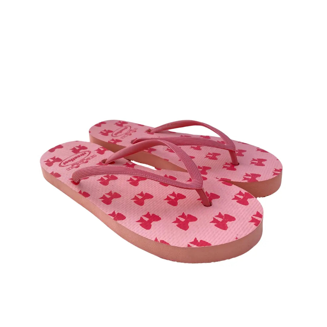 StreetFeet Coquette flip flops for women in pink with bow print

