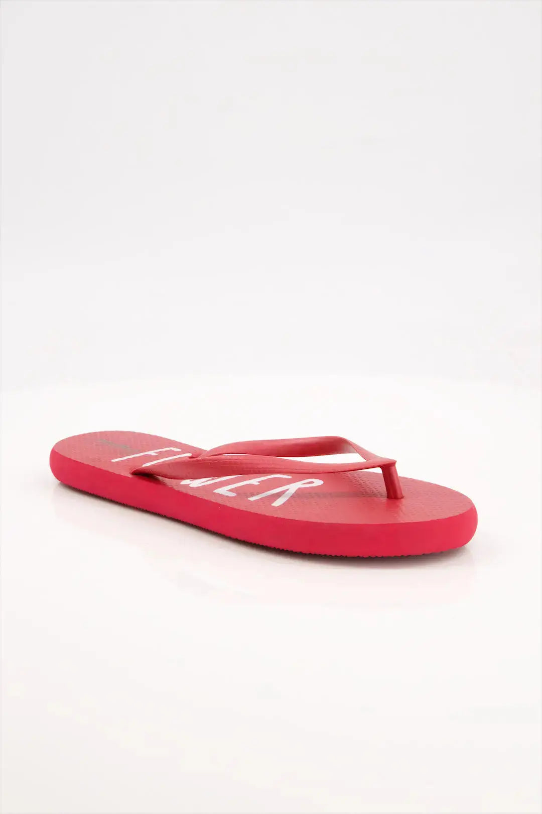 Flower Flip Flops by StreetFeet – An elegant and comfortable red footwear option with a delicate floral design, cushioned footbed, and a durable set of straps. A perfect addition to your wardrobe for a fresh and feminine look.