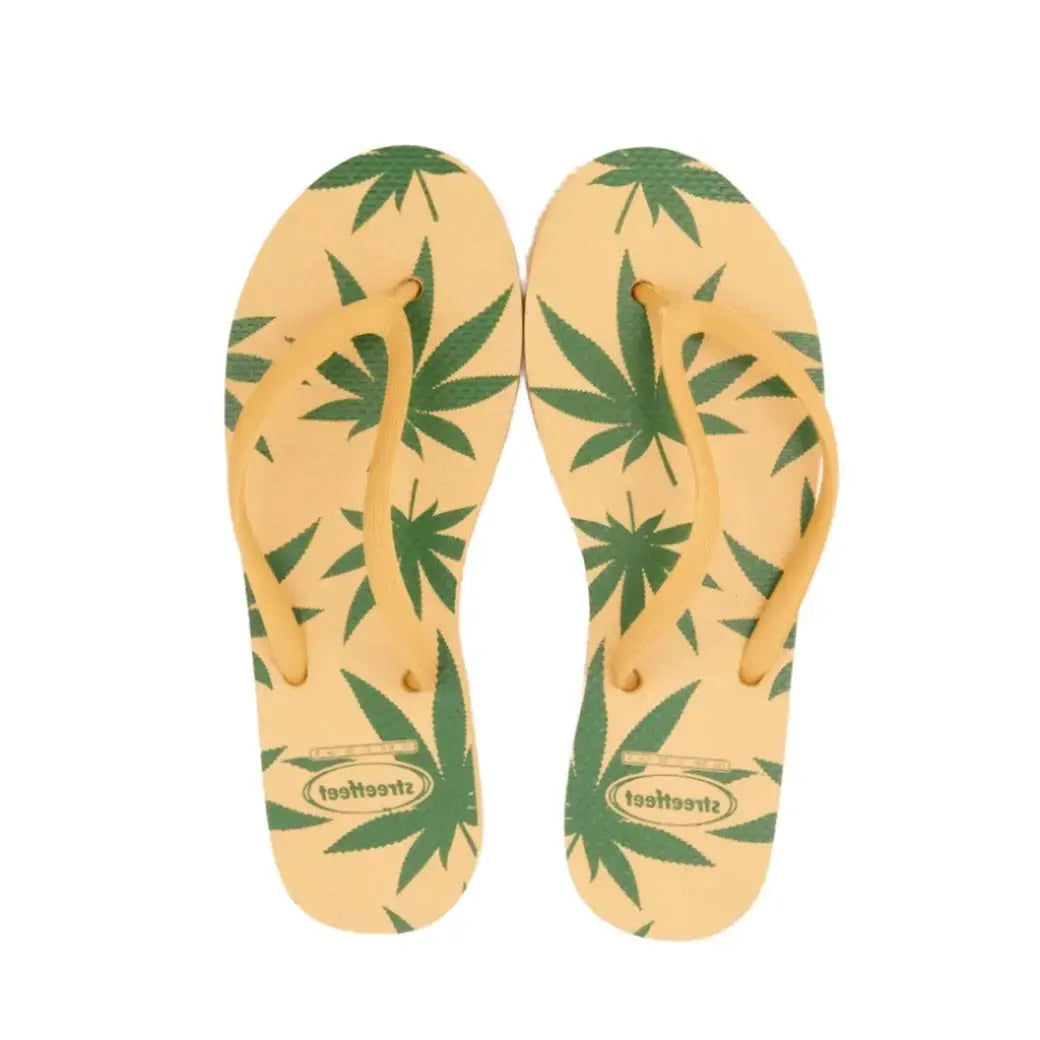 Leafy Pattern Flip-Flops with vibrant green leaf design, featuring soft cushioned soles and sturdy rubber straps.
Lightweight and breathable flip flops for casual everyday wear, perfect for summers.
Ideal ladies sandals for any occasion and activity. 
Available in 2 versatile color combinations-  yellow & black and green & off-white.