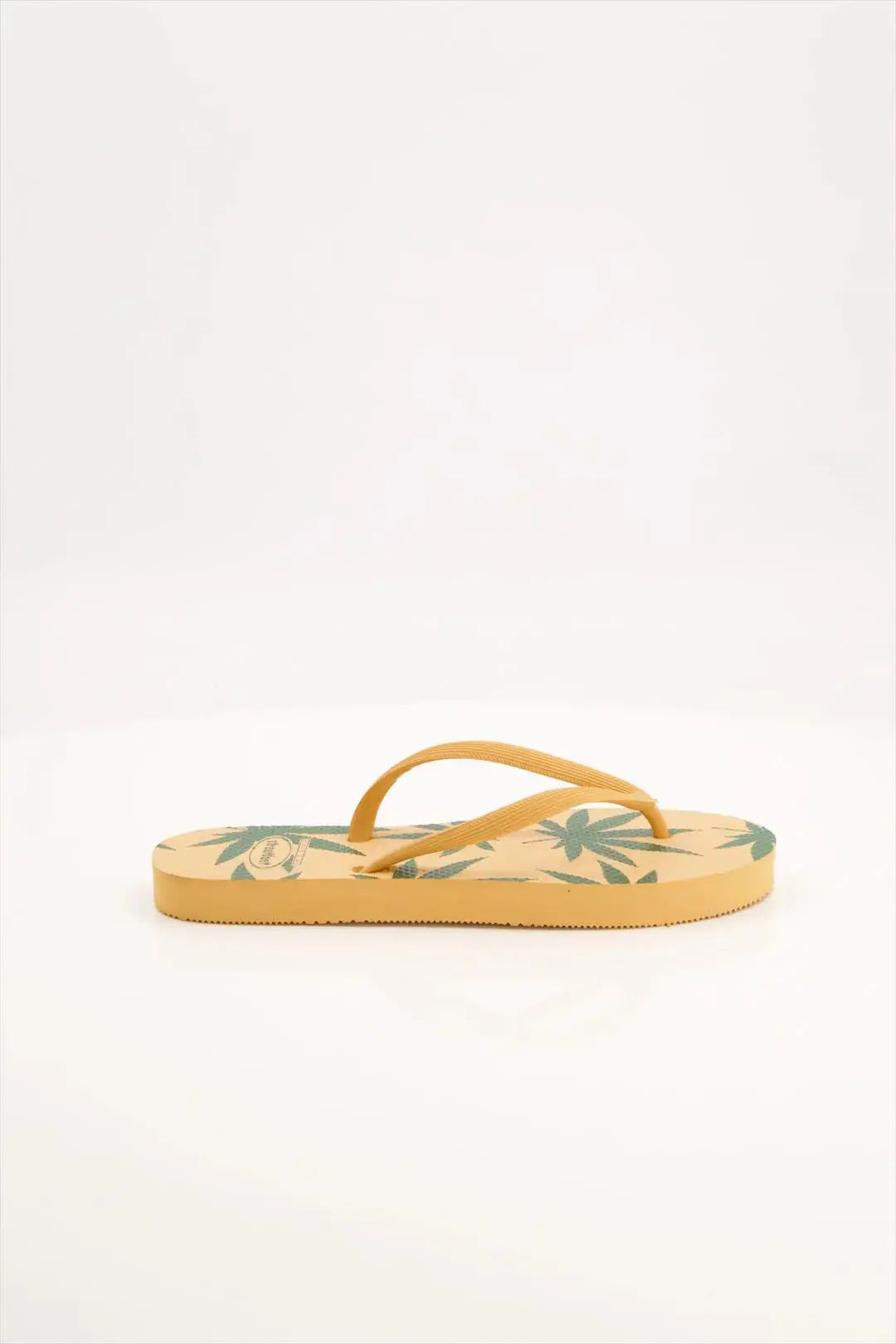 Leafy Pattern Flip-Flops with vibrant green leaf design, featuring soft cushioned soles and sturdy rubber straps.
Lightweight and breathable flip flops for casual everyday wear, perfect for summers.
Ideal ladies sandals for any occasion and activity. 
Available in 2 versatile color combinations-  yellow & black and green & off-white.