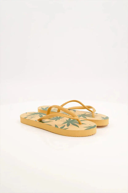 Leafy Pattern Flip-Flops with vibrant green leaf design, featuring soft cushioned soles and sturdy rubber straps.
Lightweight and breathable flip flops for casual everyday wear, perfect for summers.
Ideal ladies sandals for any occasion and activity. 
Available in 2 versatile color combinations-  yellow & black and green & off-white.