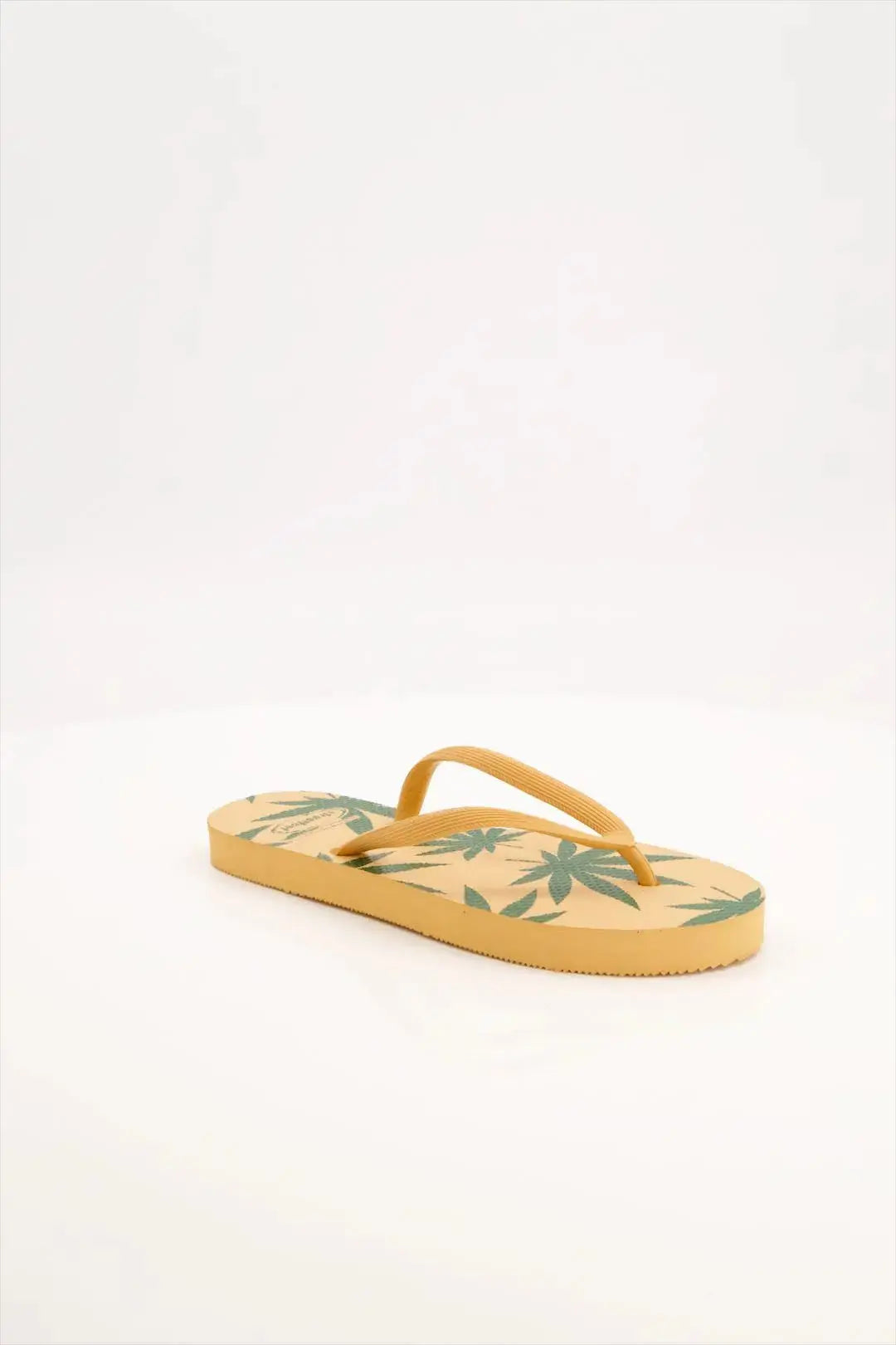 Leafy Pattern Flip-Flops with vibrant green leaf design, featuring soft cushioned soles and sturdy rubber straps.
Lightweight and breathable flip flops for casual everyday wear, perfect for summers.
Ideal ladies sandals for any occasion and activity. 
Available in 2 versatile color combinations-  yellow & black and green & off-white.