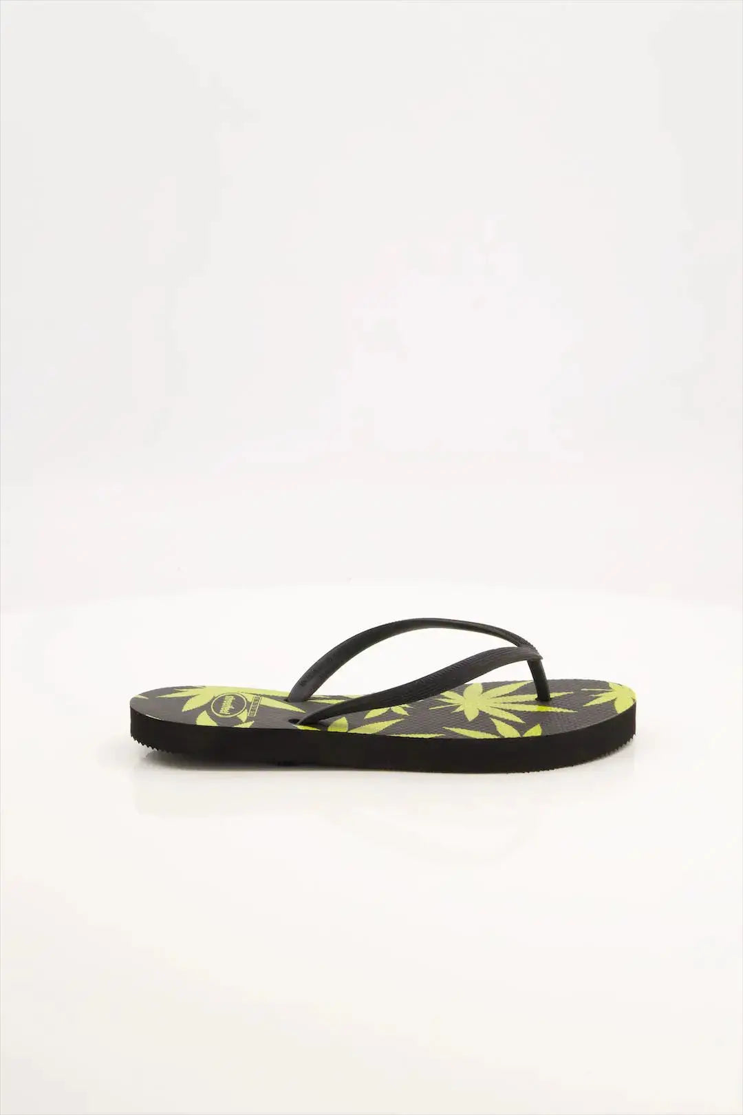 Leafy Pattern Flip-Flops with vibrant green leaf design, featuring soft cushioned soles and sturdy rubber straps.
Lightweight and breathable flip flops for casual everyday wear, perfect for summers.
Ideal ladies sandals for any occasion and activity. 
Available in 2 versatile color combinations-  yellow & black and green & off-white.