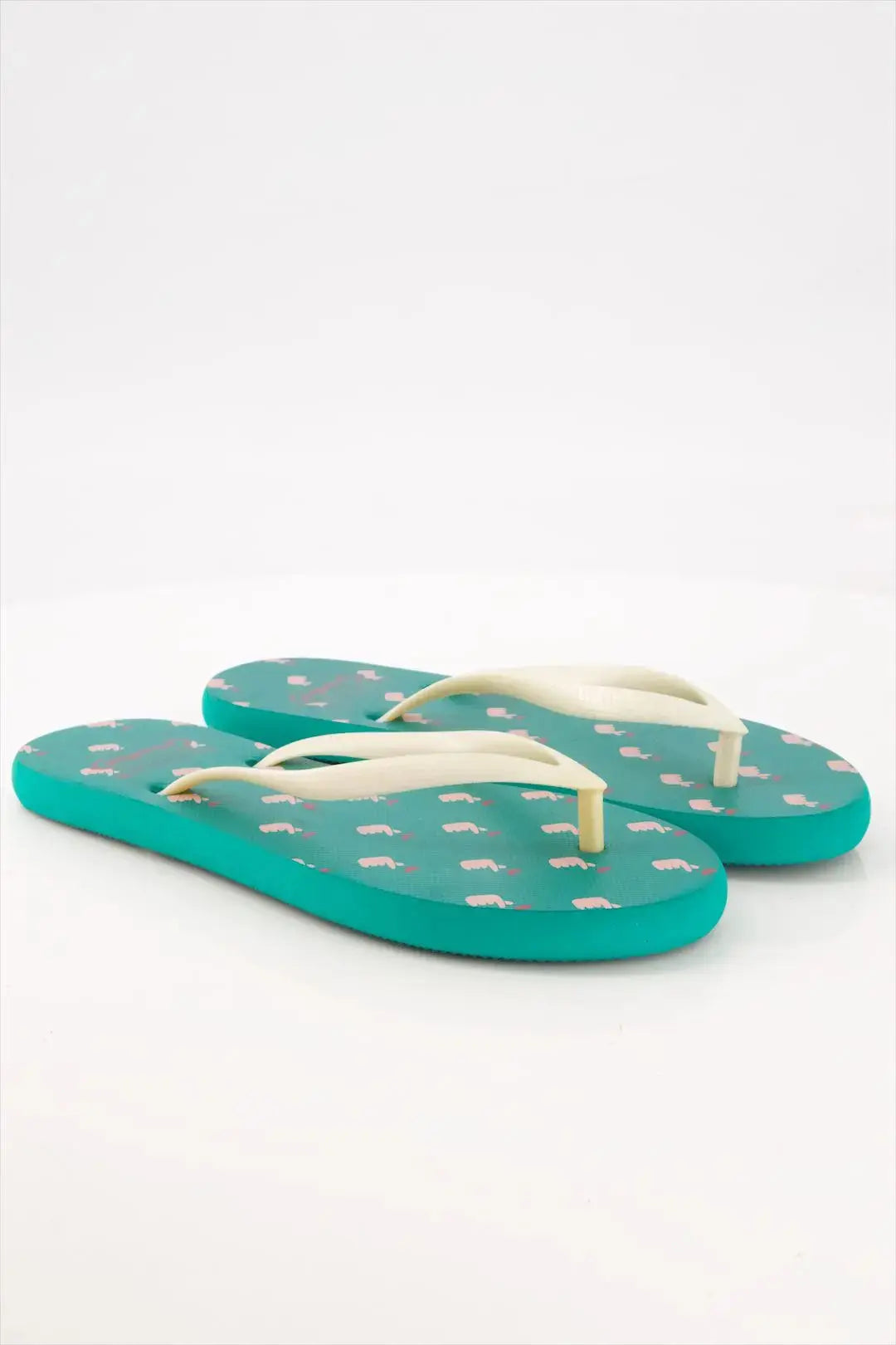 K-HEART Flip Flops by StreetFeet –  A light-green, stylish, breathable and comfortable pair of ladies chappal with finger heart design, cushioned footbed, and durable outsole with strong off-white straps. Perfect for K-pop lovers and those who love a cute, minimal style.