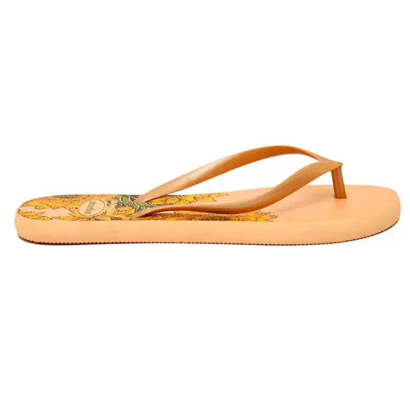 Bloom Flip-Flops featuring a yellow floral design, soft cushioned soles, and durable rubber straps for everyday comfort. Available in 4 variants- yellow, red, black and white.