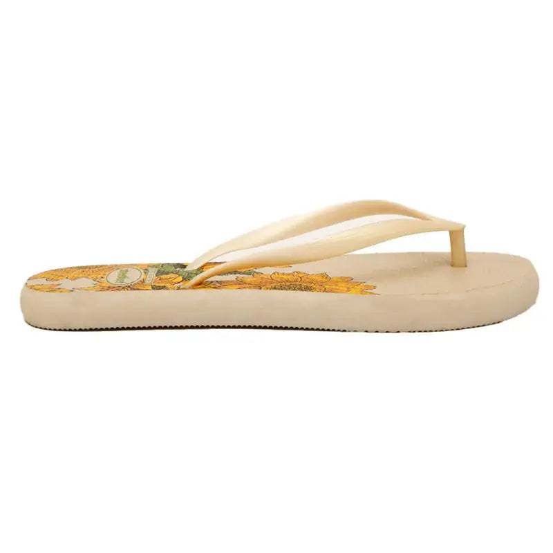Bloom Flip-Flops featuring a yellow floral design, soft cushioned soles, and durable rubber straps for everyday comfort. Available in 4 variants- yellow, red, black and white.