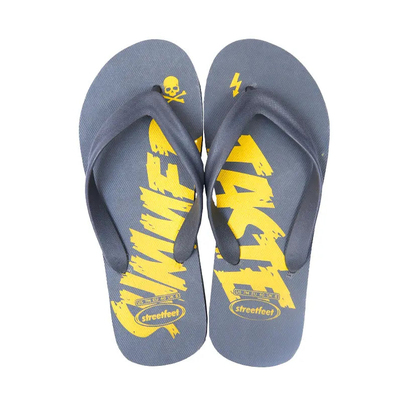 Men’s Summer Taste Flip-Flops by Street Feet featuring vibrant printed designs, lightweight cushioned soles, and durable rubber straps for casual, breathable all-day comfort. Available in 4 masculine colours- Grey, green read and blue.