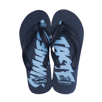 Men’s Summer Taste Flip-Flops by Street Feet featuring vibrant printed designs, lightweight cushioned soles, and durable rubber straps for casual, breathable all-day comfort. Available in 4 masculine colours- Grey, green read and blue.